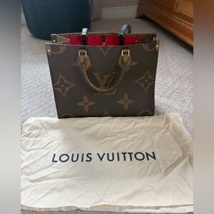 Louis Vuitton On The Go MM Canvas Tote with Red Interior